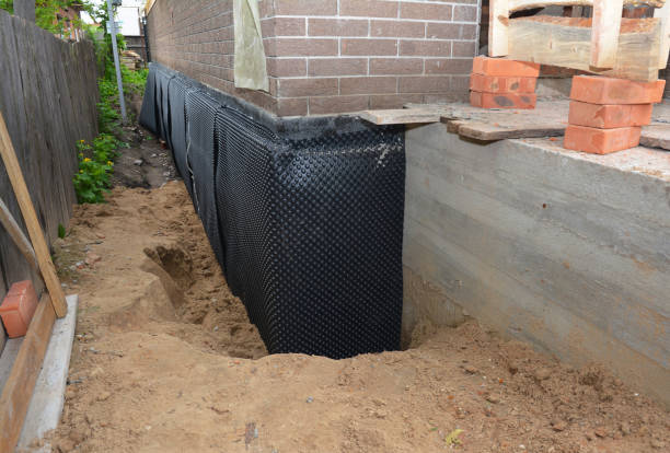 Happy homeowners after waterproofing job in Delphos